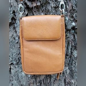 Hammacher Schlemmer, this is the leather crossbody wallet.